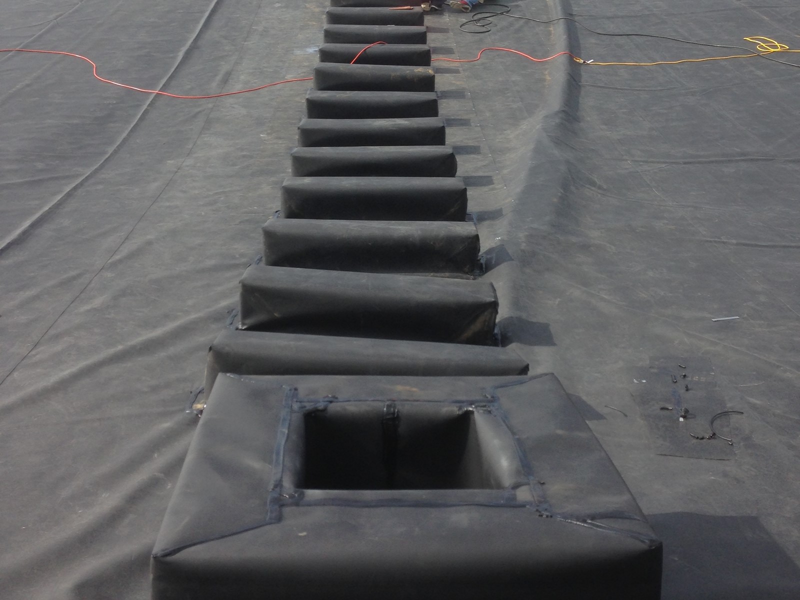 Engineered Fill Ramps Secondary Containment | Inland Tarp